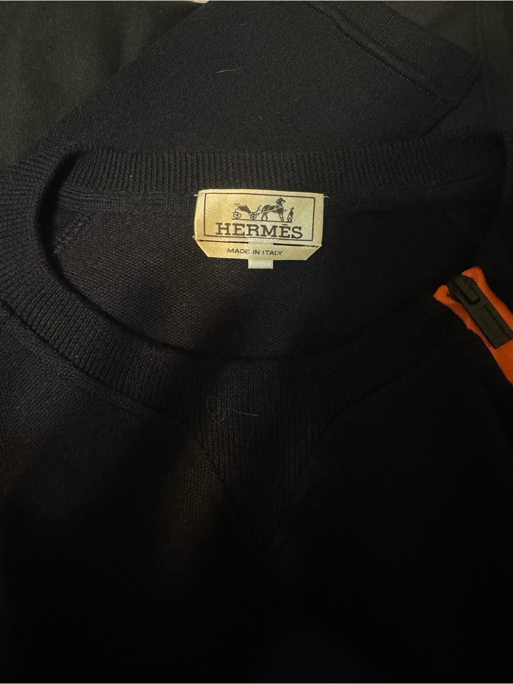 Hermès Black Crewneck Sweater with Orange Zip Accent
